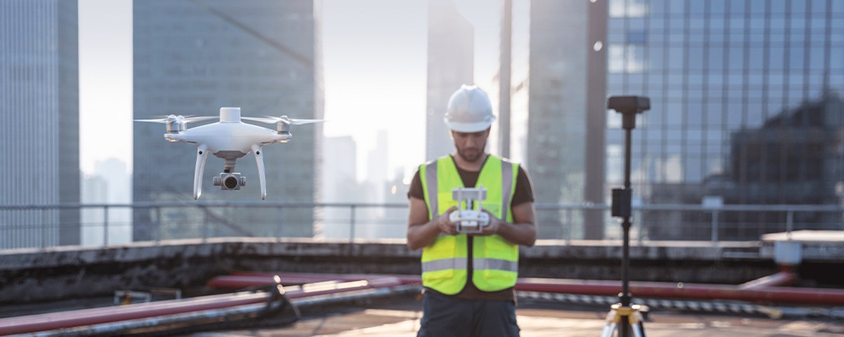 DJI Phantom 4 RTK in flight on a survey site