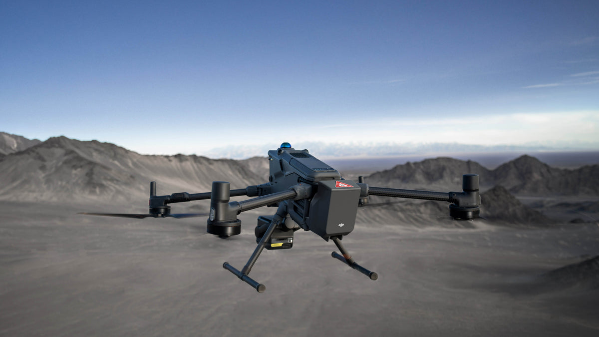 DJI Matrice 400 in flight with the DJI AP100 Parachute mounted on top