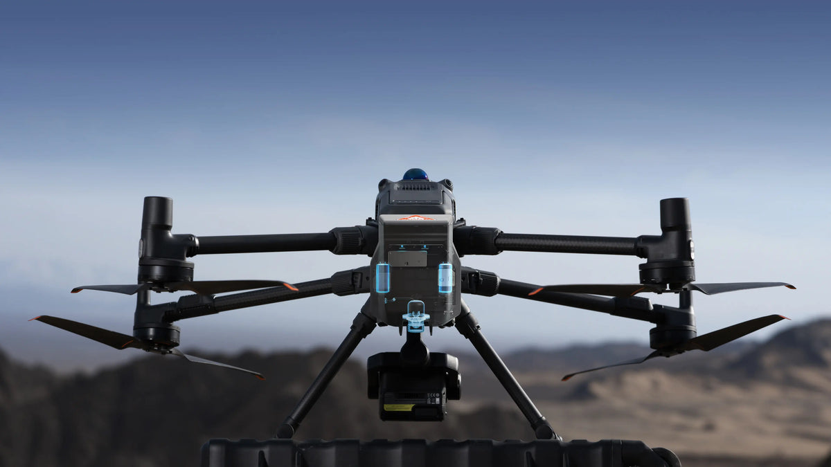 Front view of the DJI Matrice 400 with AP100 Parachute mounted, showing dual redundant safety highlights